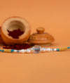 925 Silver Crystal Pearl Rakhi with Blue Thread - Rakhi Gift