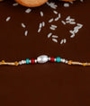 925 Silver Oval Bead Rakhi with Gold Thread - Rakhi Gift